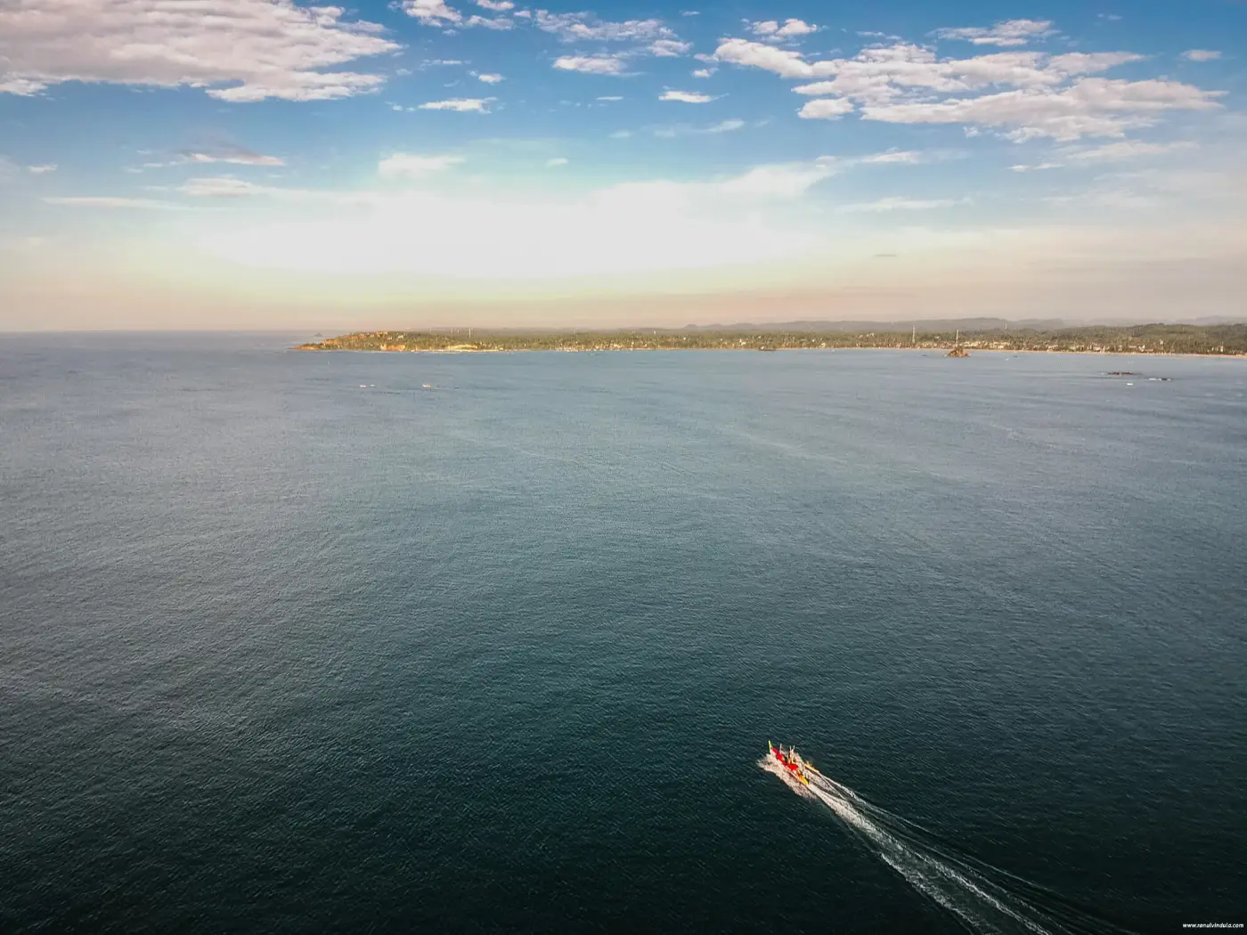 Weligama Bay, Sri Lanka — aerial drone photo with fishing boat